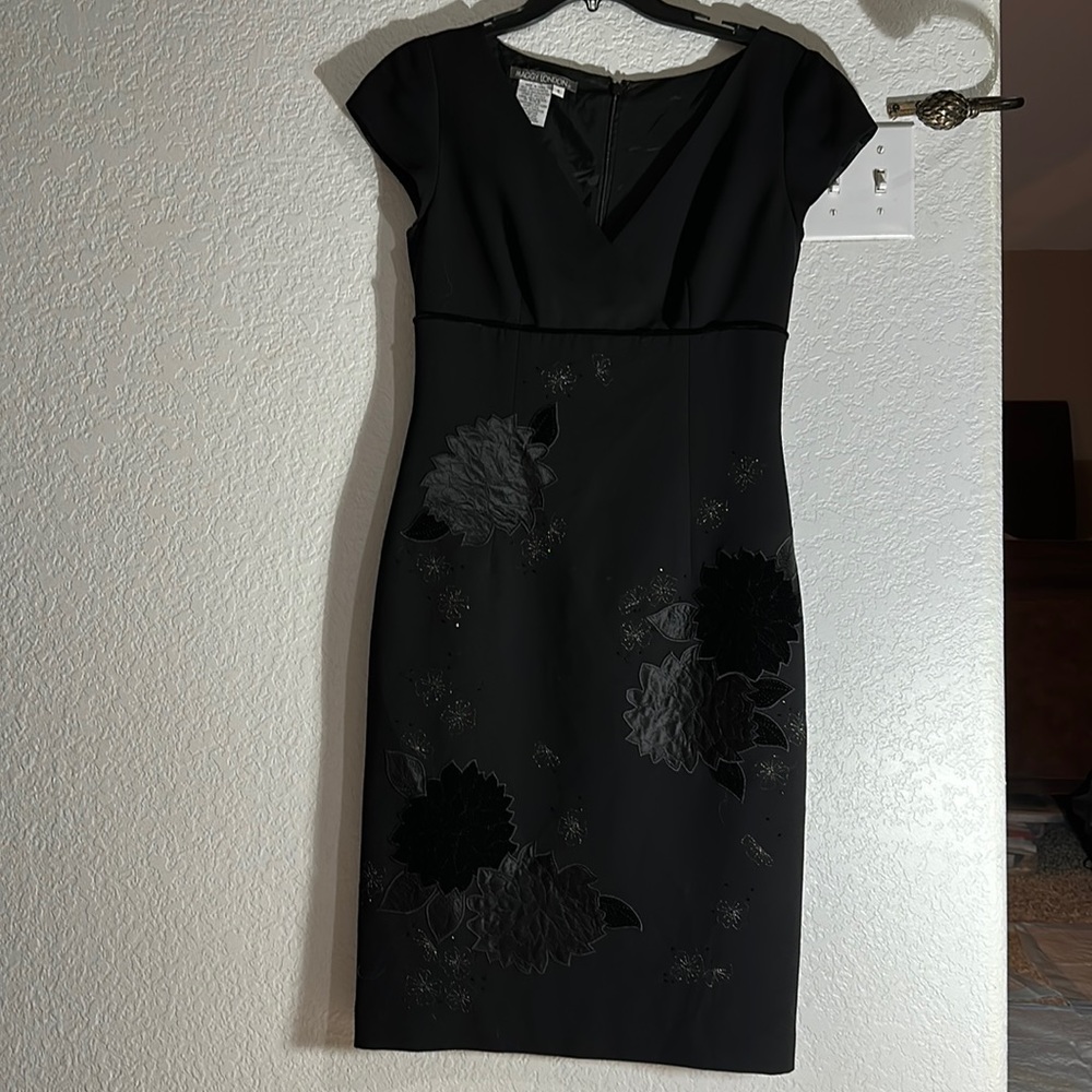 Black dress with embroidered and velvet flowers